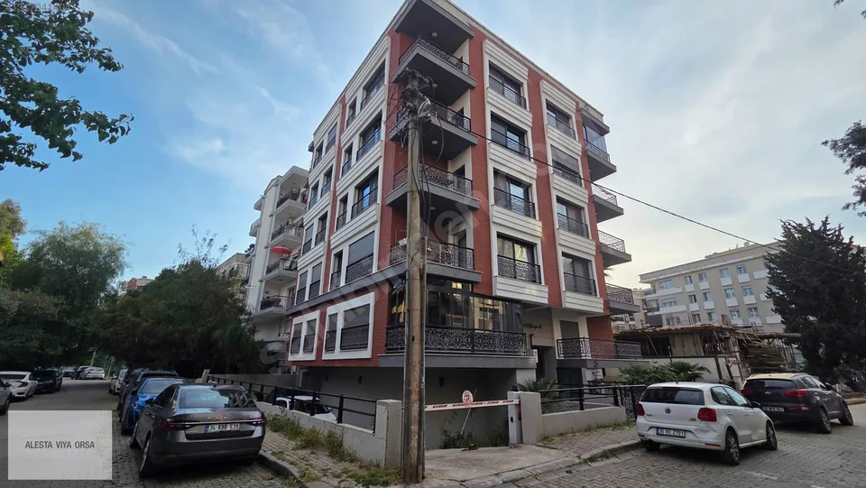 Bostanlı'da otoparklı binada ebeveyn banyolu 3+1 daire, fotoğraf 1